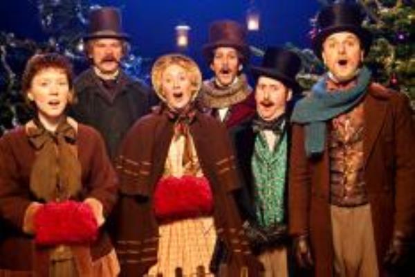 A group of people including Ben Willbond, Alice Lowe, Martha Howe-Douglas, Jim Howick, Simon Farnaby, Mathew Baynton wearing hats and scarves for Horrible Histories Christmas