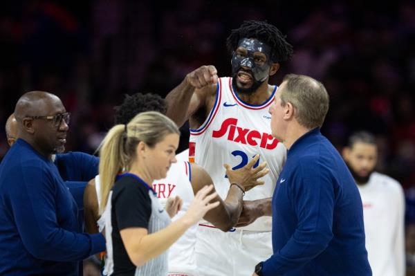 76ers center Joel Embiid (21) argues with referee Jenna Schroeder (20) and is ejected on a second technical foul