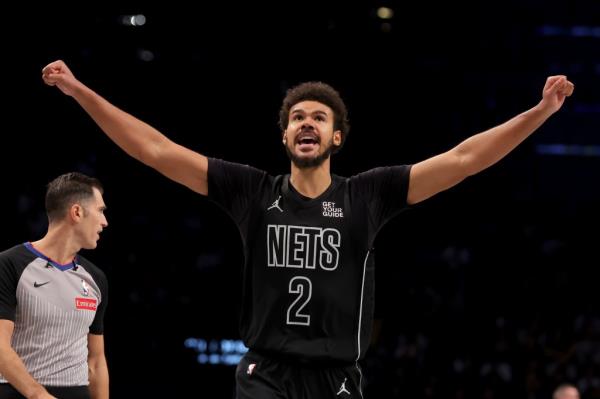 Cam Johnson celebrates during the fourth quarter of the Nets' win.