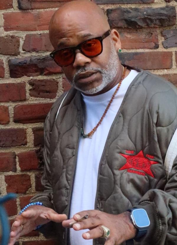 Damon Dash, music mogul and entrepreneur, wearing sunglasses and a jacket on the Upper East Side of New York City