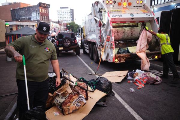 New York City Department of Sanitation workers clearing out a drug addict encampment on Melrose Avenue in The Hub on Sept. 6, 2024.