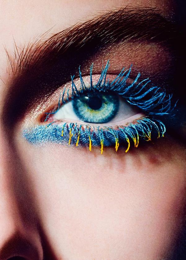 Close-up of a woman's eye showcasing an elaborate makeup look, L'Eté Papillon de Chanel, created in 2013