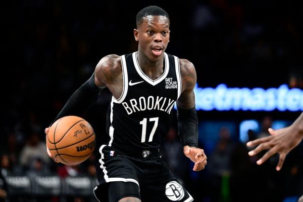 Dennis Schroder #17 of the Brooklyn Nets handles the ball against the Milwaukee Bucks during the second half at Barclays Center on December 08, 2024 in New York City. 