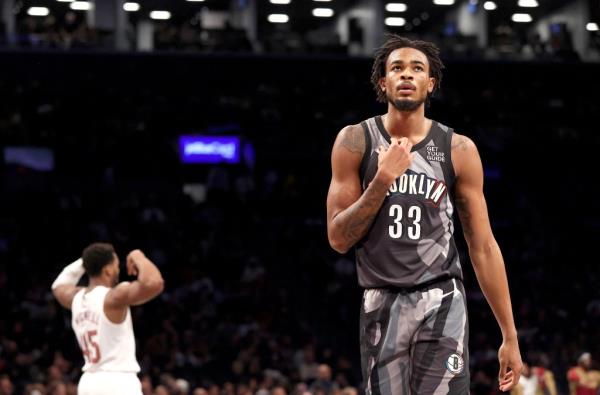 Nic Claxton #33 of the Brooklyn Nets reacts after the Cleveland Cavaliers score