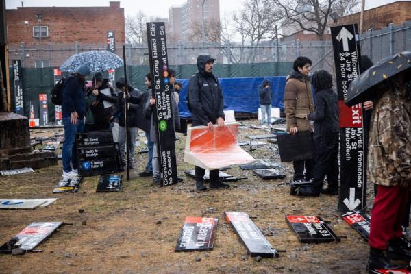 Straphangers line up at the Gravesend lot wher<em></em>e the MTA opened its annual pop-up sale to the public on Monday