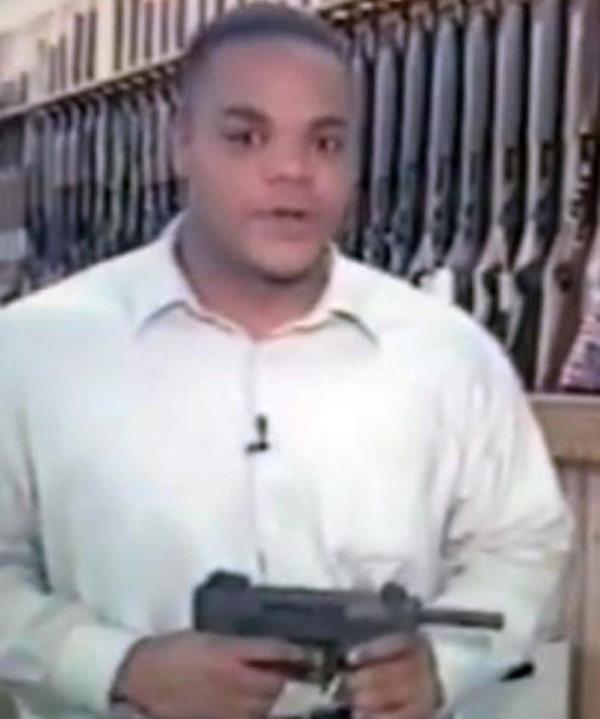 Broadcast image shows Vester Lee Flanagan holding a gun